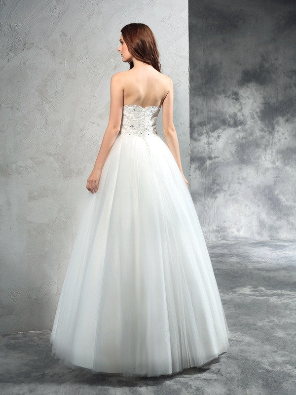 A-Line/Princess Sweetheart Beading Sleeveless Long Net Wedding Dresses